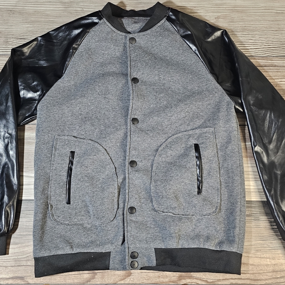 Black and gray varsity jacket no name no brand .